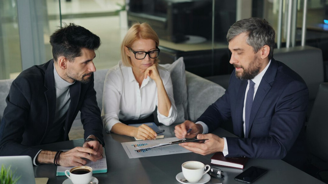 business people negotiating in meeting