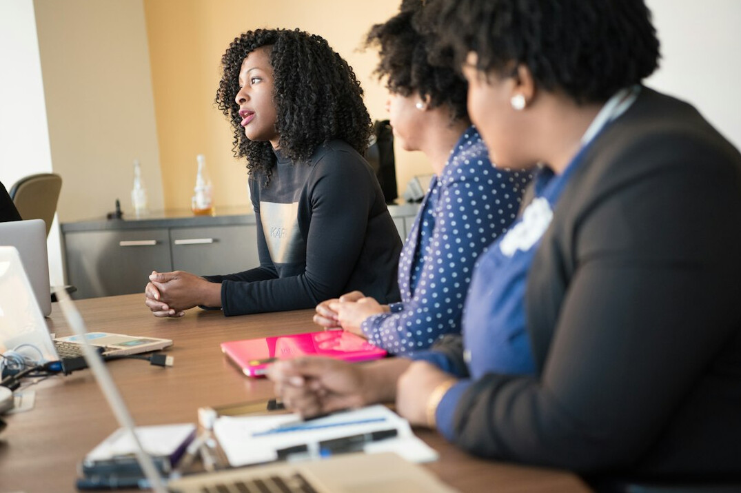 professional woman leading meeting