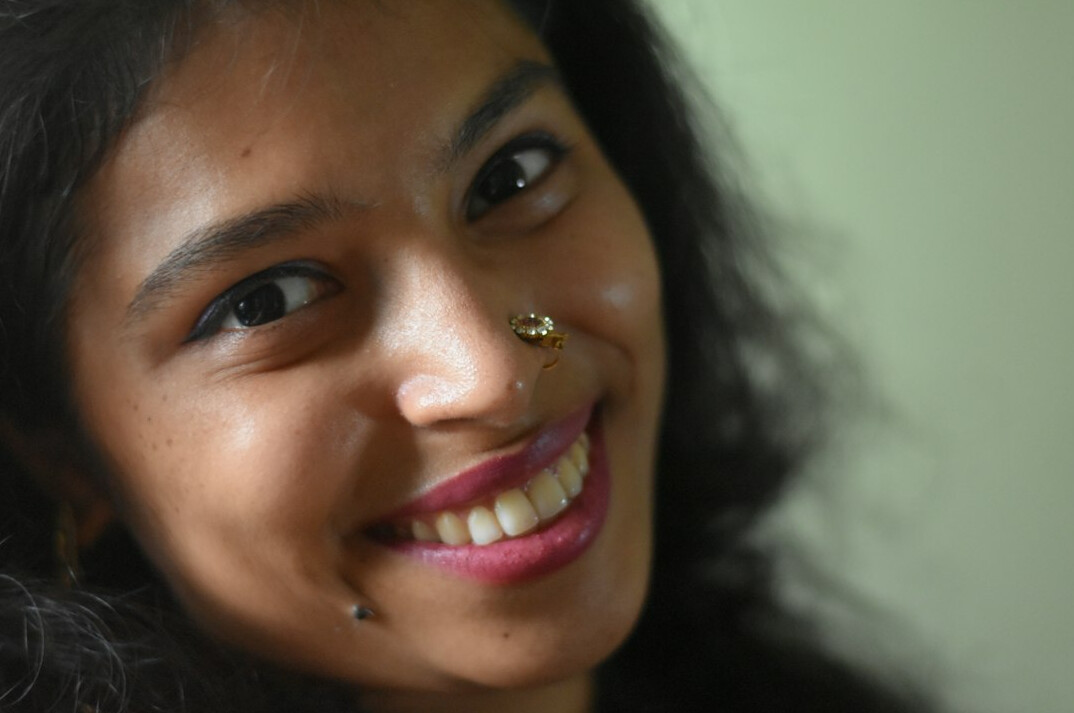 Portrait of a young woman with a warm smile